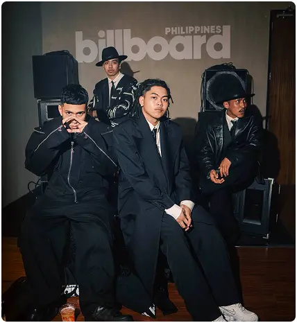 A music crew photographed after an award night
